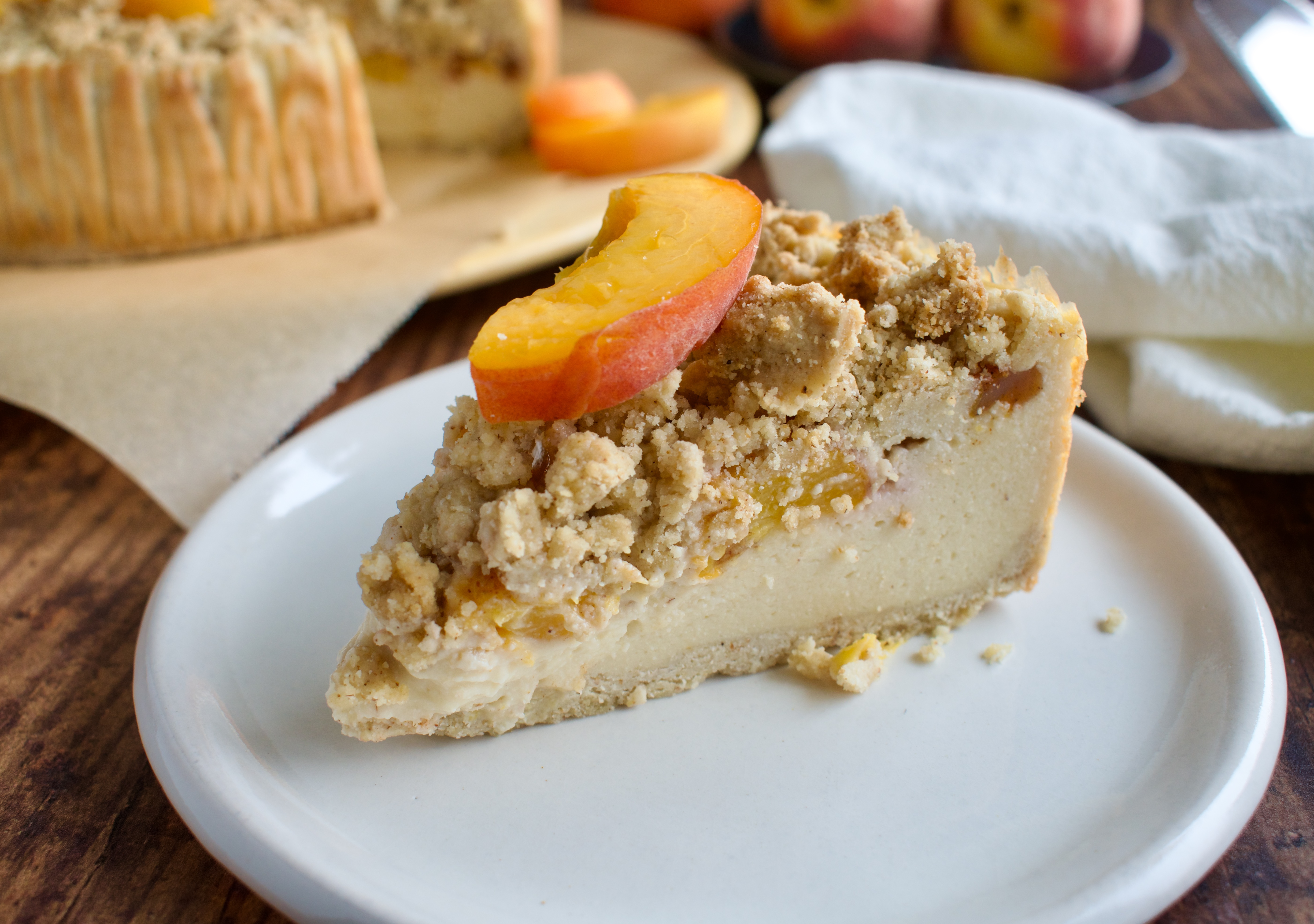 gluten free and dairy free peach crumble cheesecake