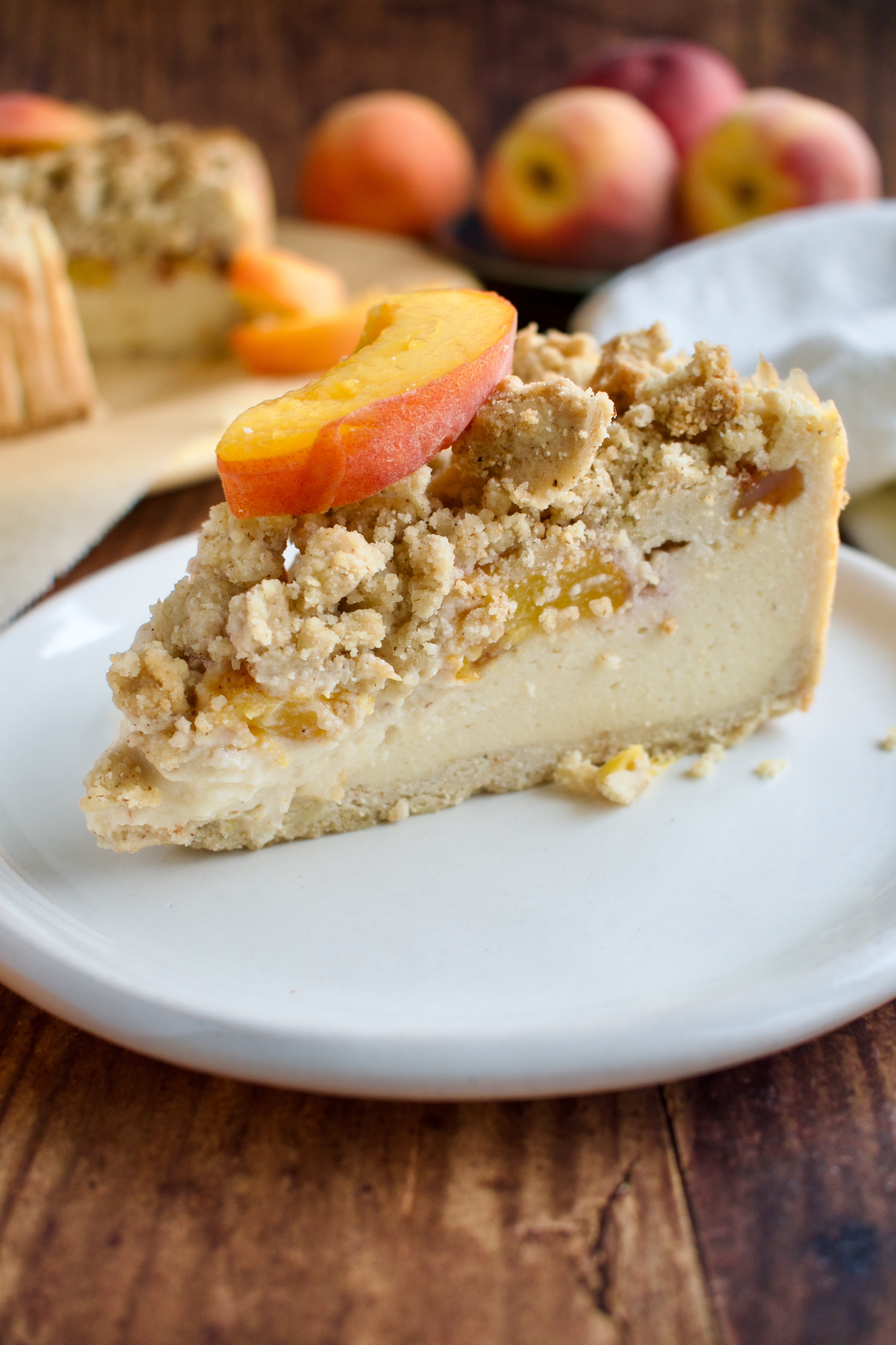 gluten free and dairy free peach crumble cheesecake