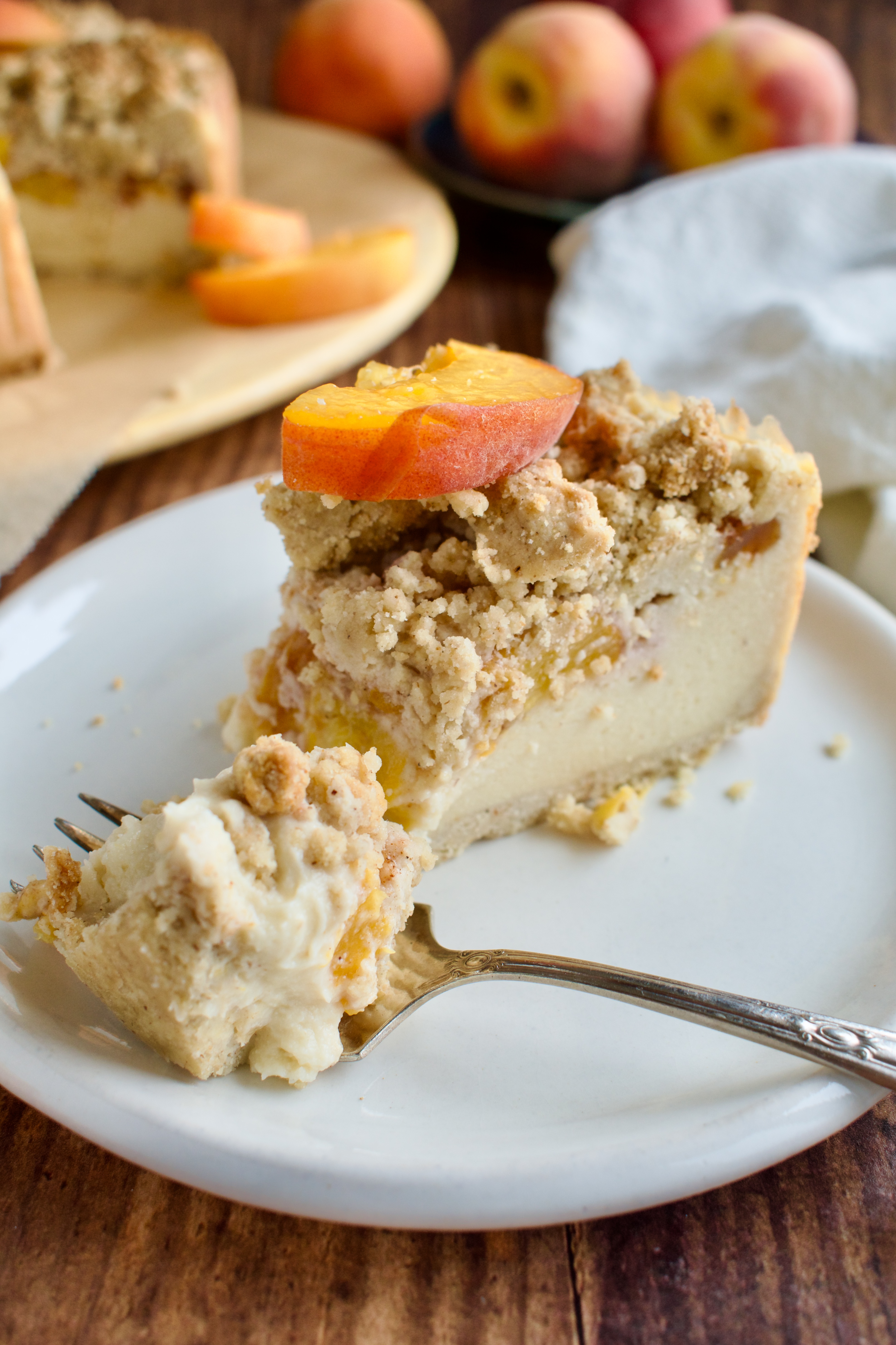 gluten free and dairy free peach crumble cheesecake