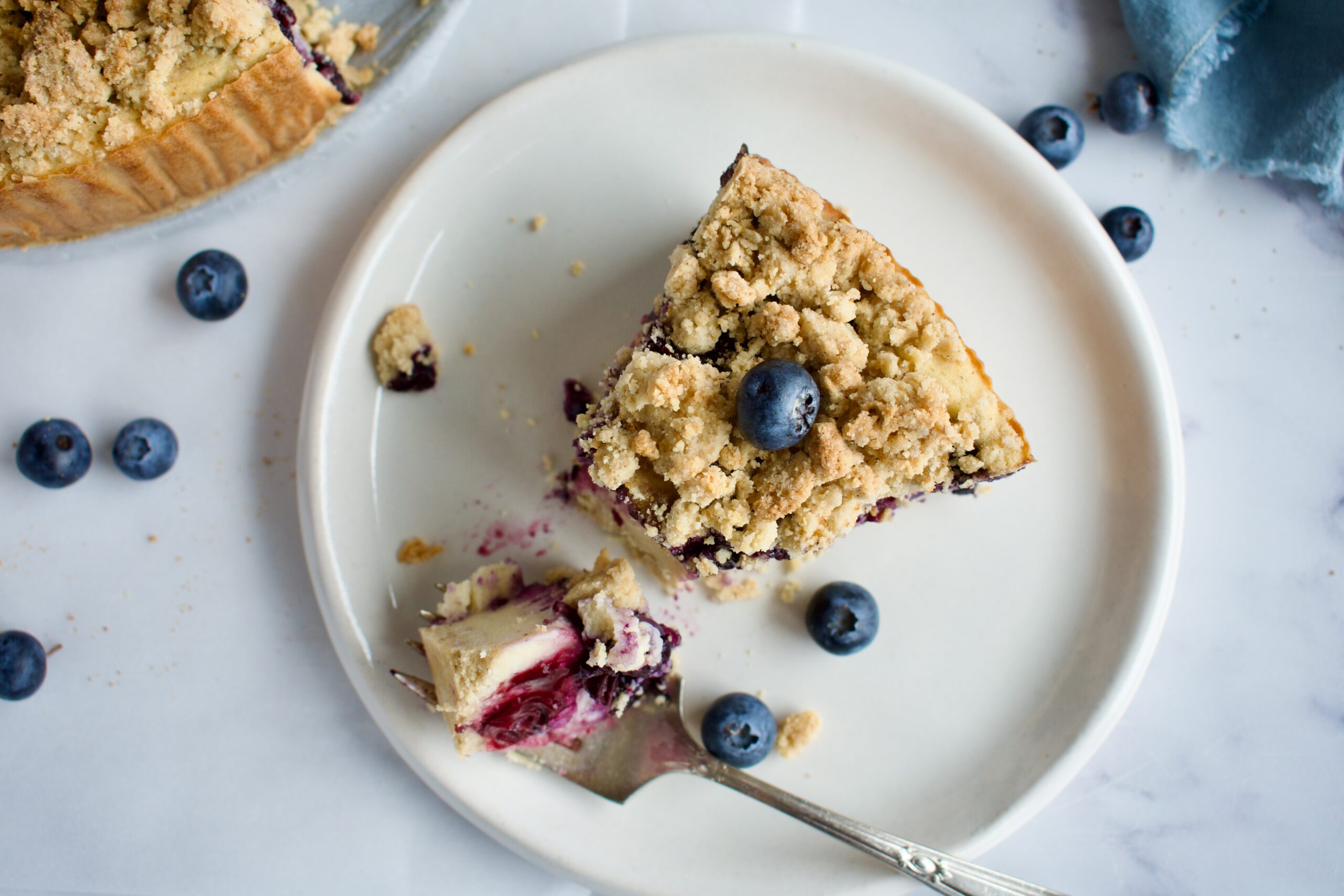 gluten free and dairy free blueberry crumble cheesecake