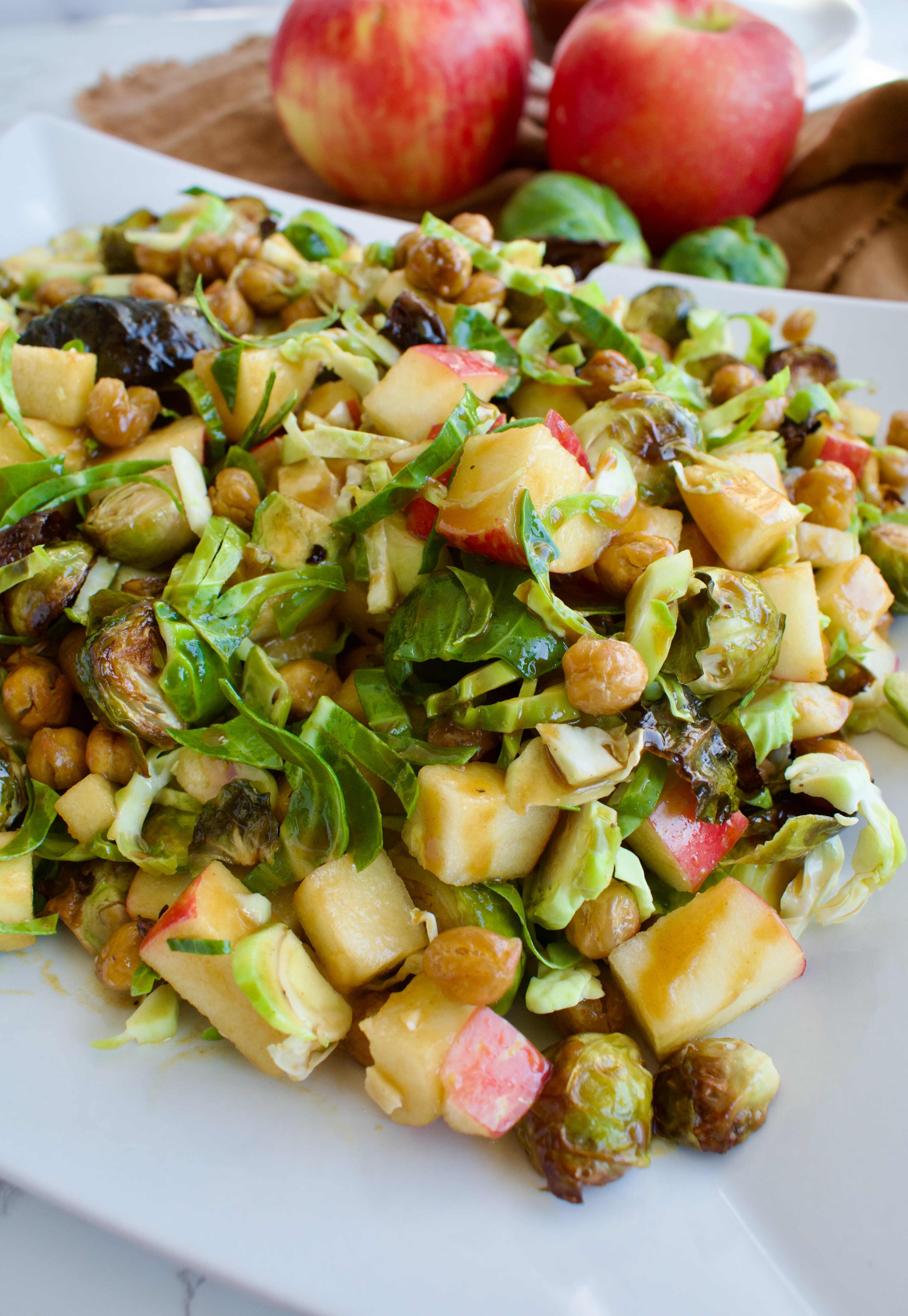 gluten free and vegetarian brussels sprout salad with apples and chickpeas