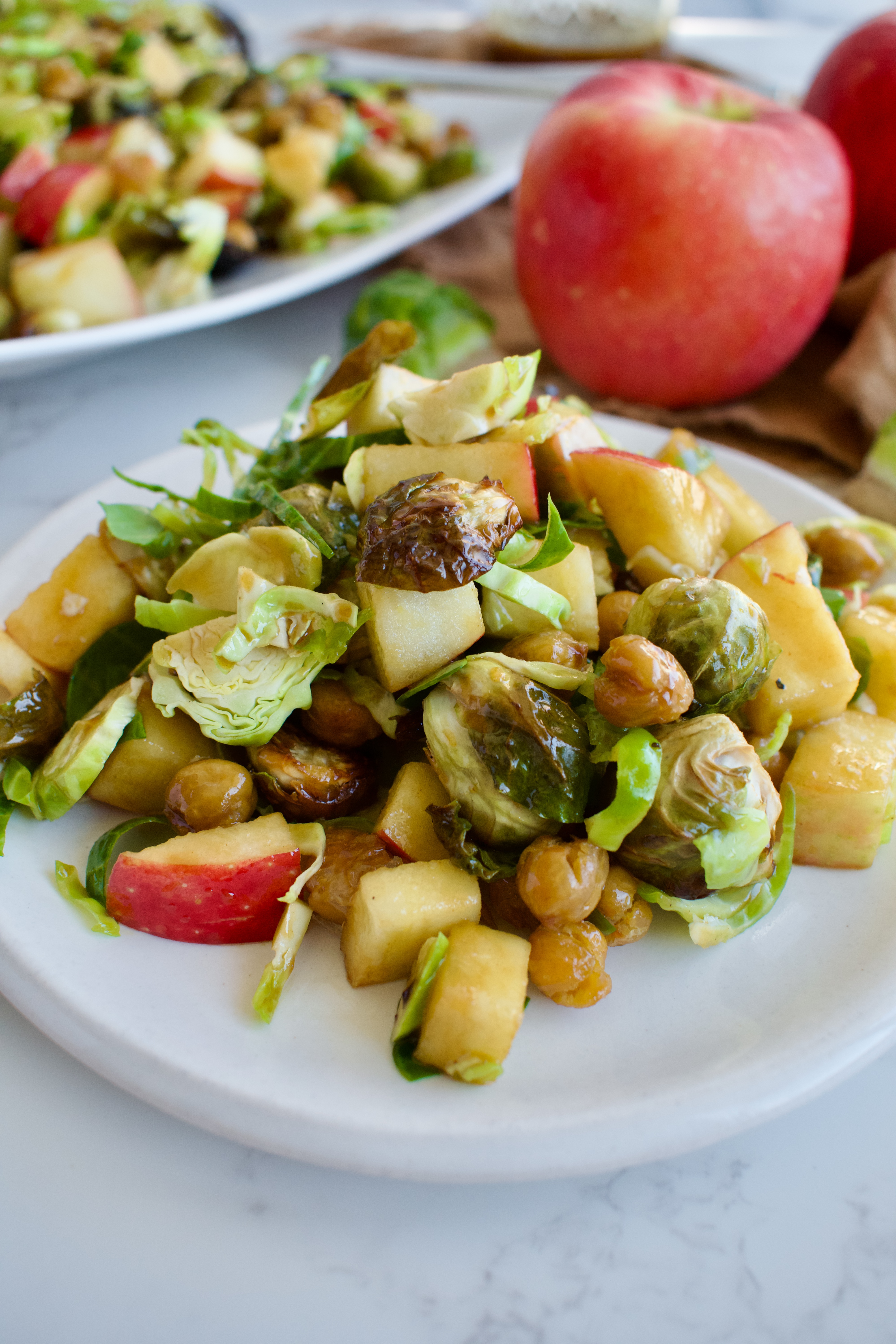 brussels sprout salad with apples and chickpeas