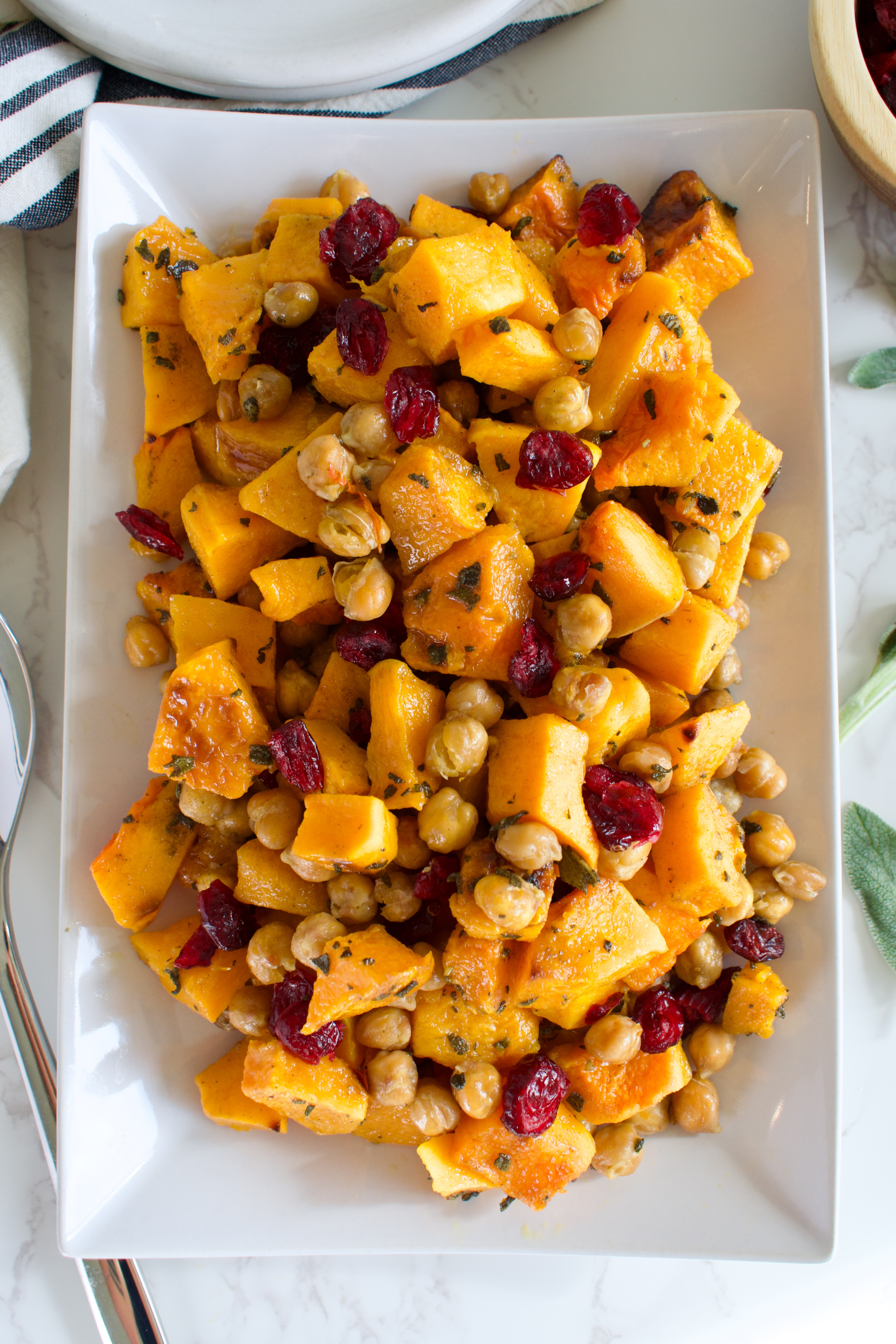 gluten free and vegan sage roasted butternut squash with chickpeas and cranberries