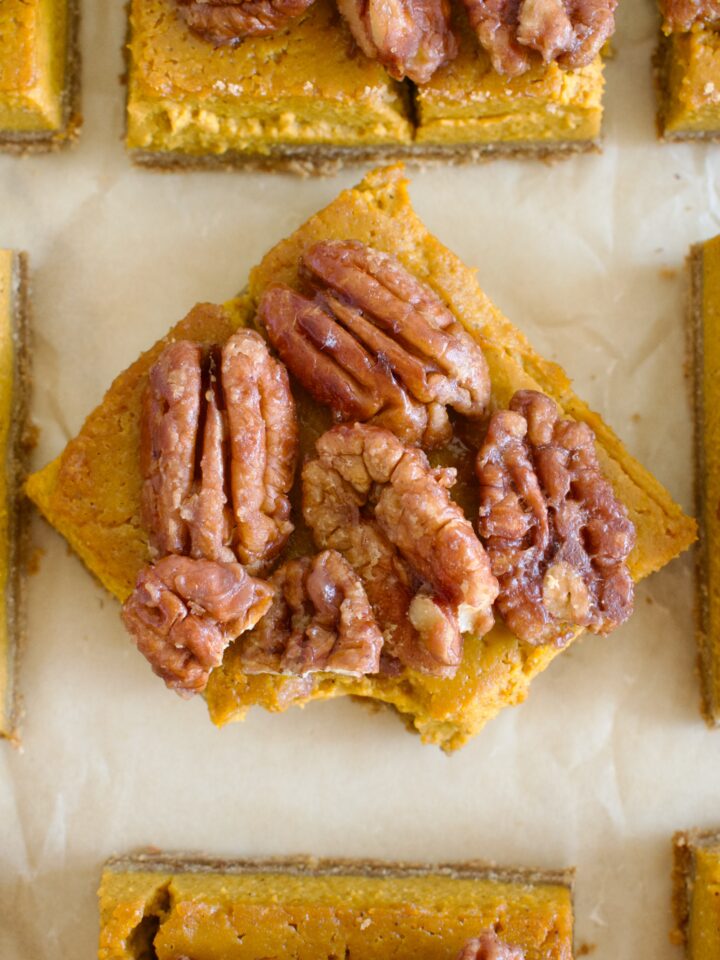 gluten free and dairy free pumpkin pie bars with caramelized pecans