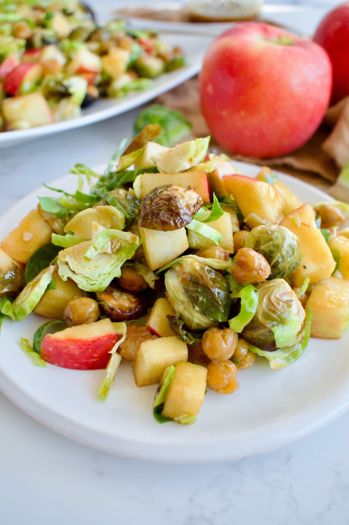 fall brussels sprouts salad with apples and chickpeas