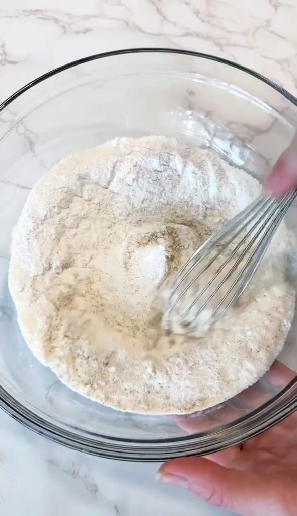 mixing dry ingredients for gluten free donuts