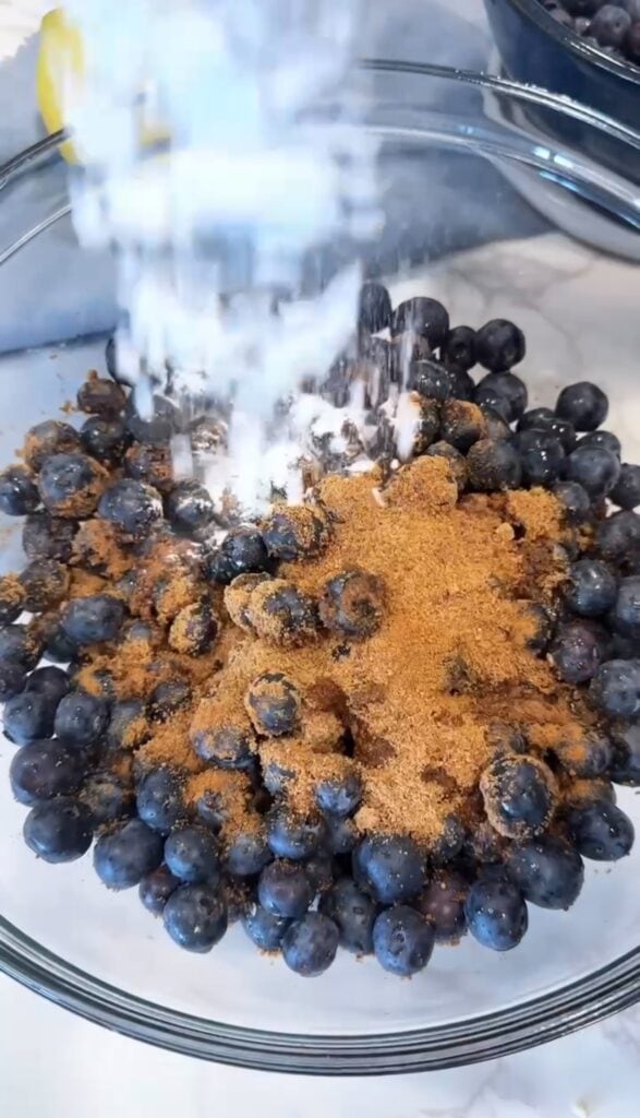 mixing ingredients for blueberry pie filling